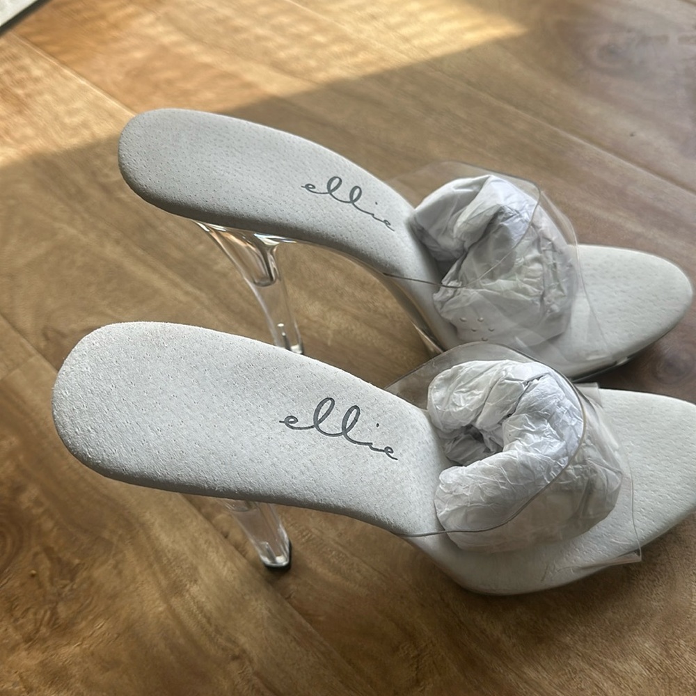 Never worn 4” lucite stiletto platforms size 9